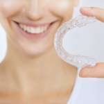 smiling showing product